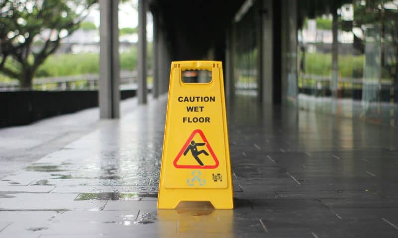 are wet floor signs required by law